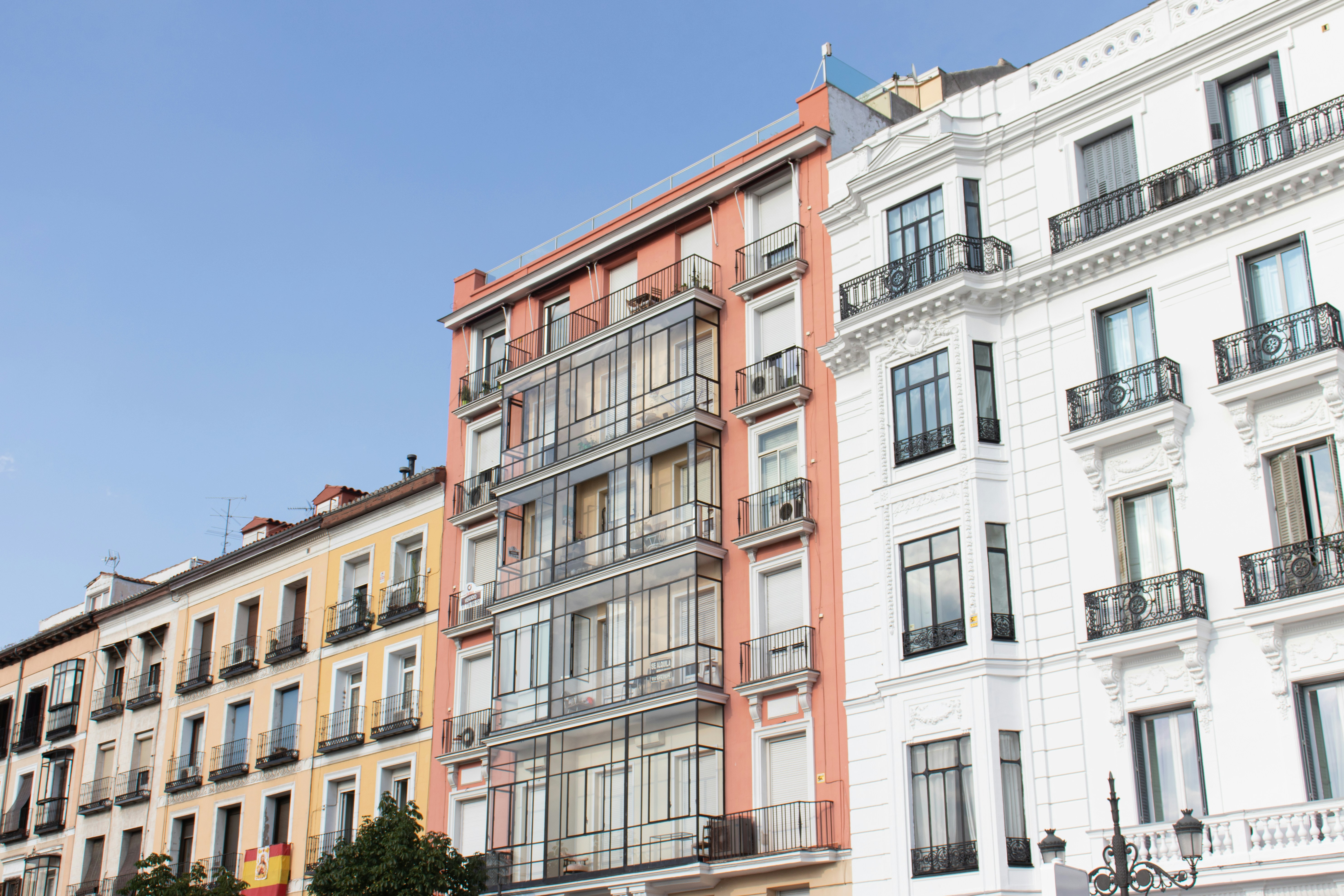 white and brown concrete building under blue sky during daytime