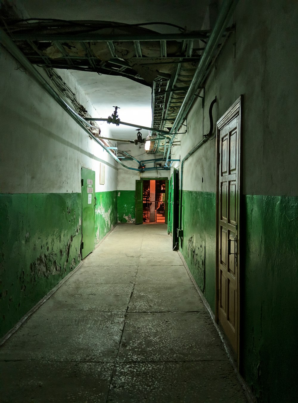 empty hallway with green walls