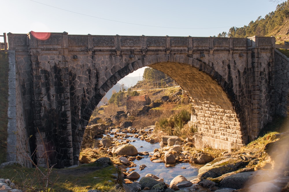 brown concrete bridge over river