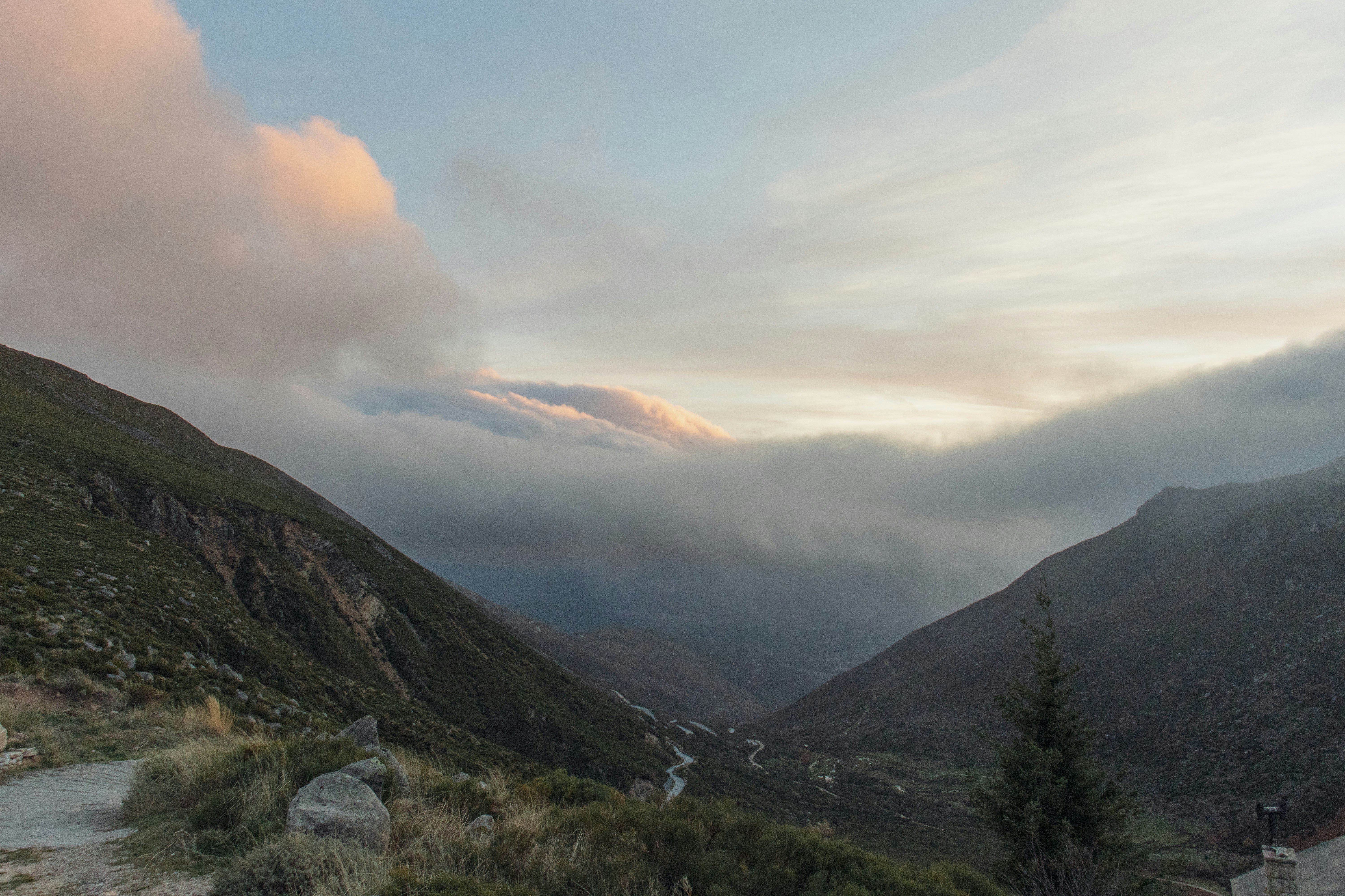 green mountains under white clouds during daytime