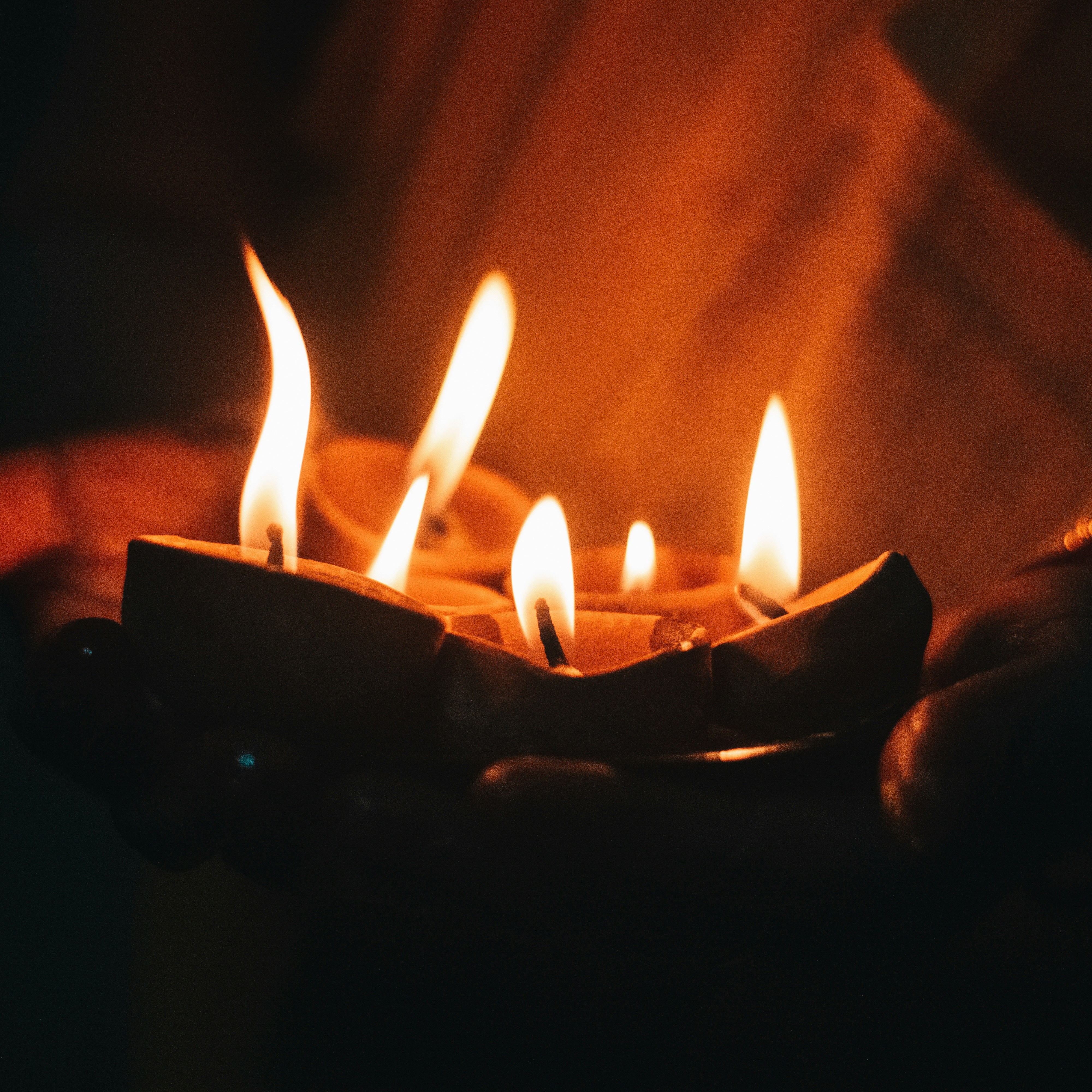 Lighted candle on black holder photo – Free Brown Image on Unsplash
