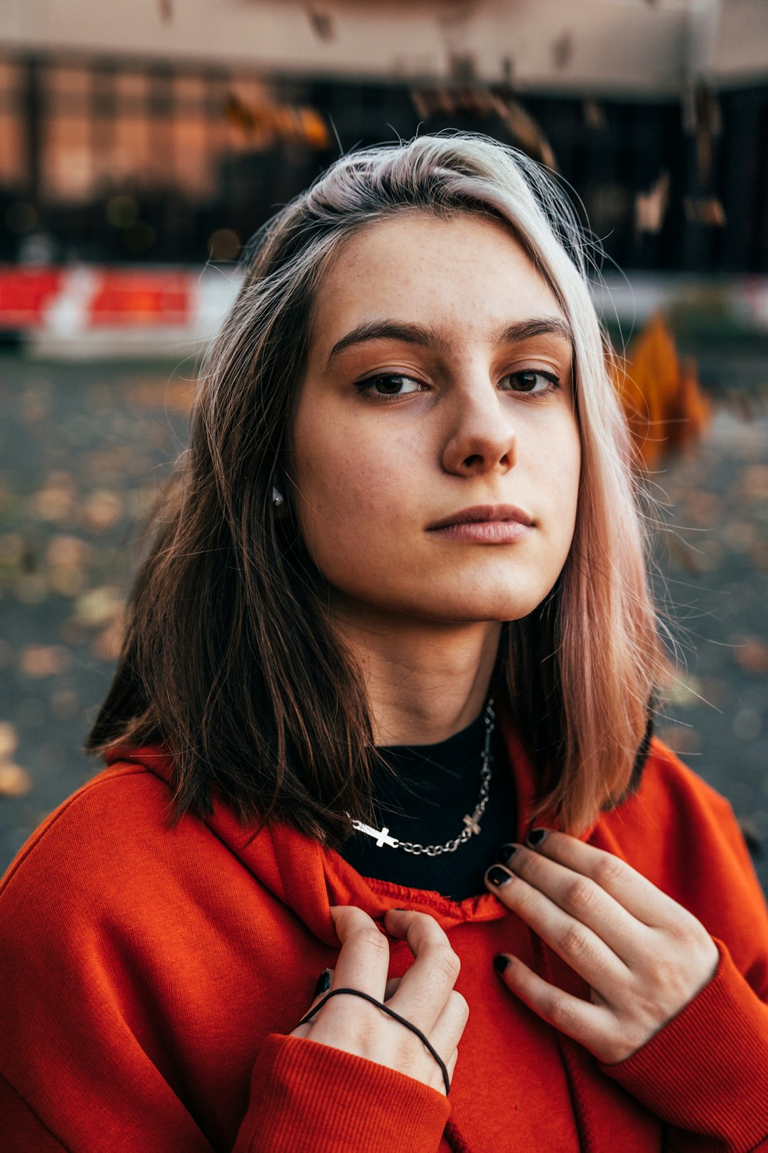 woman in red and black shirt