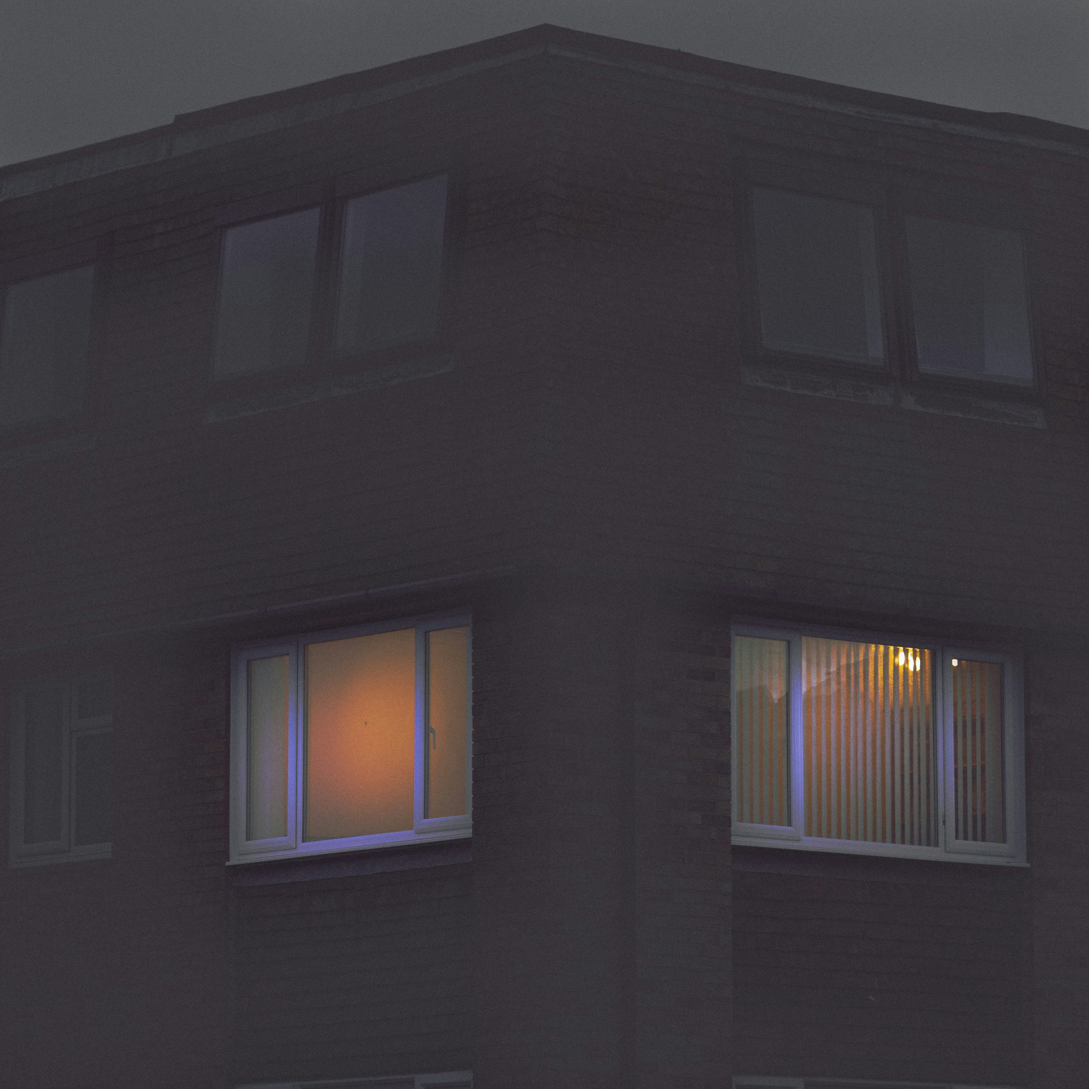 white framed glass windows during daytime