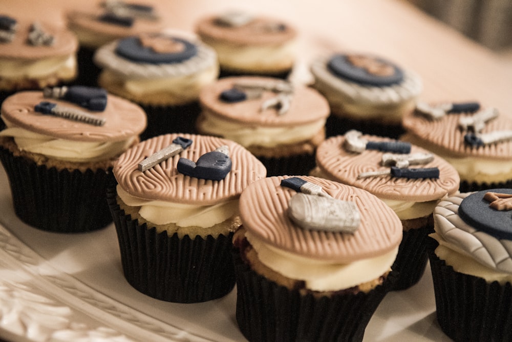 cupcakes with chocolate and blue icing on top