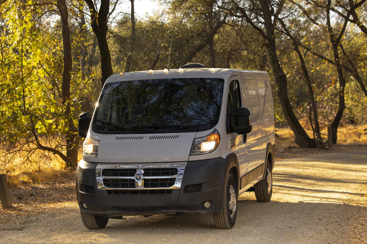 White passenger van on the road