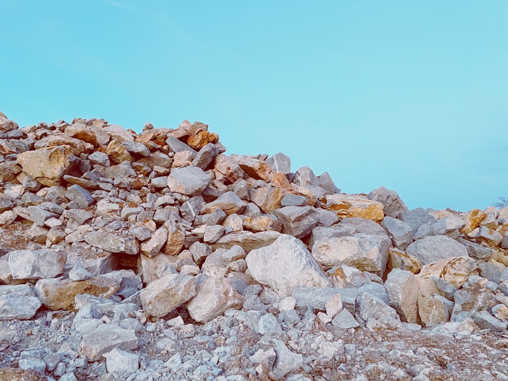 brown rocky mountain under blue sky during daytime