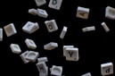 white and black letter t-letter blocks