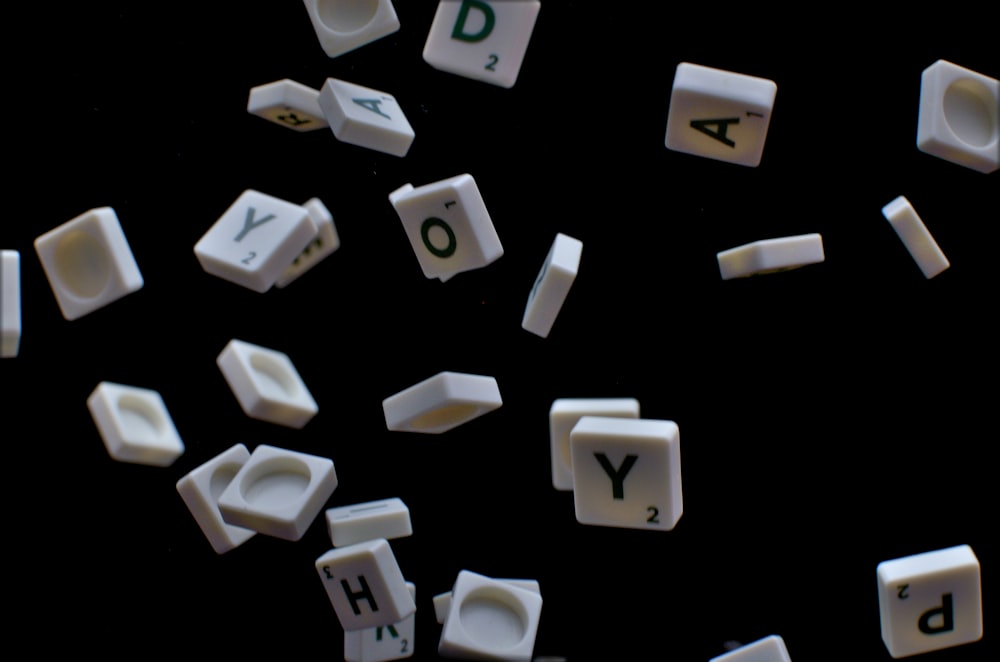 white and black letter t-letter blocks