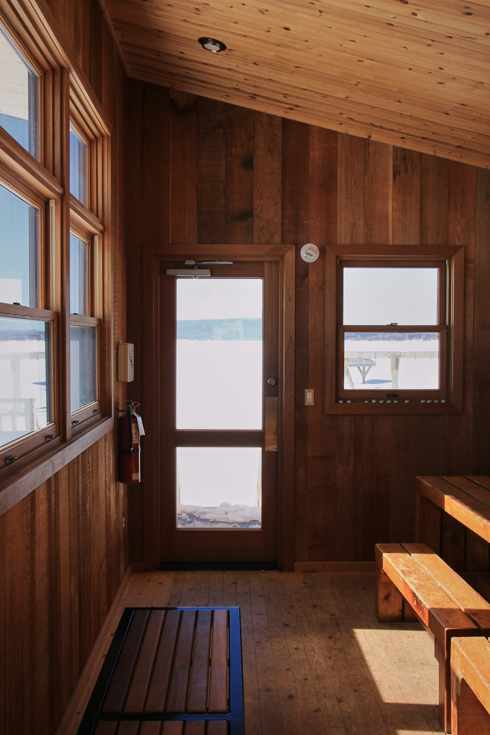 brown wooden framed glass window