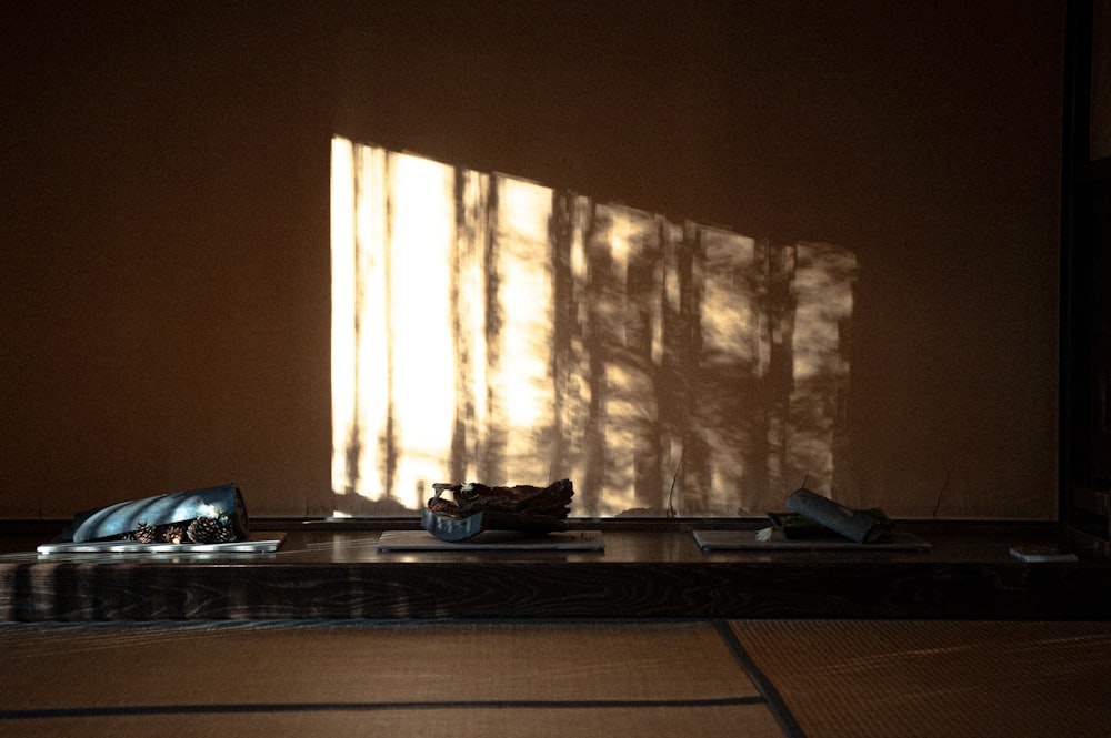 black laptop computer on brown wooden table