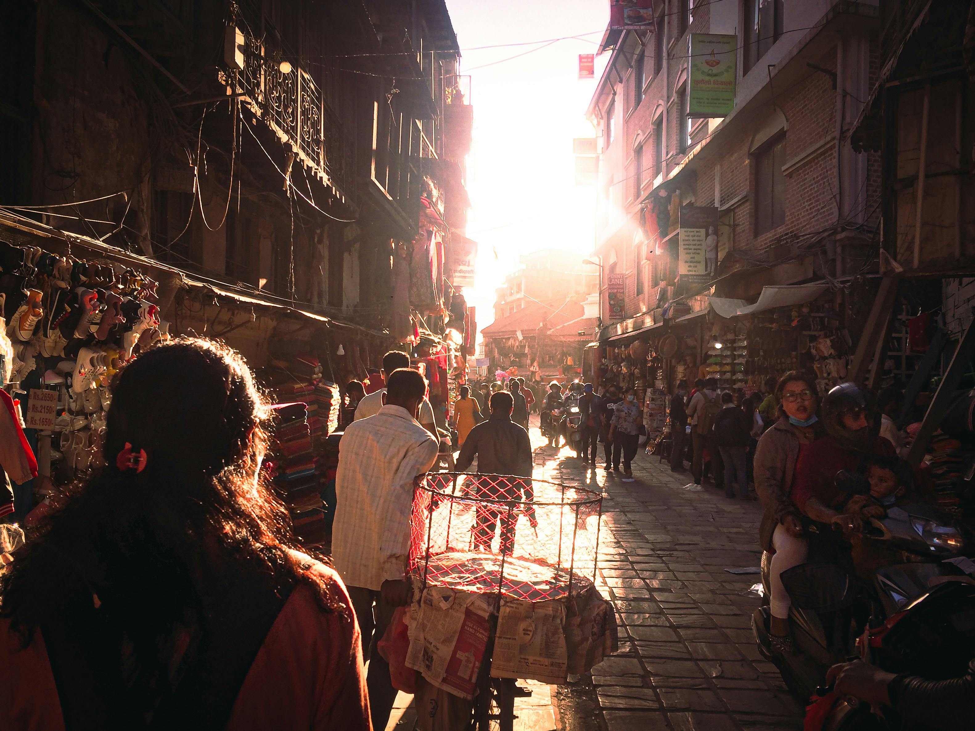 people walking on street during night time
