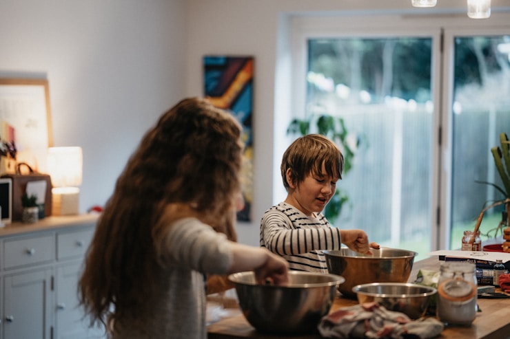 Kitty and Oz baking a Norman Castle cake for Ozzy's History homework. 