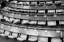 brown wooden chairs on gray concrete floor