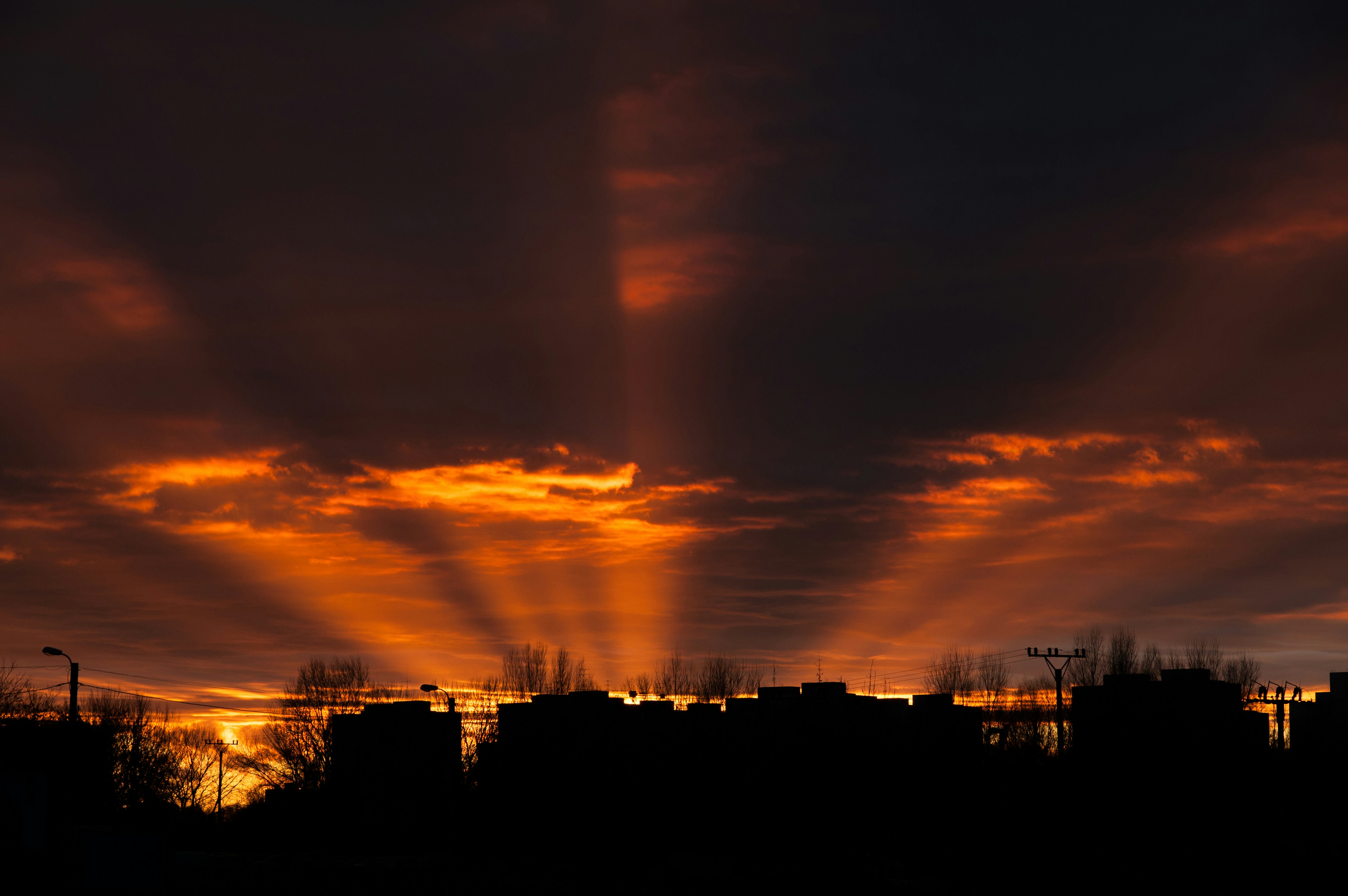 silhouette of buildings during sunset