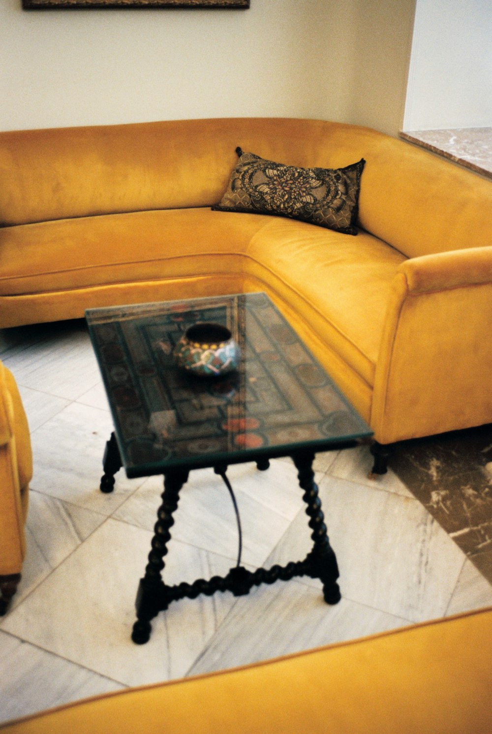 black metal framed glass top coffee table