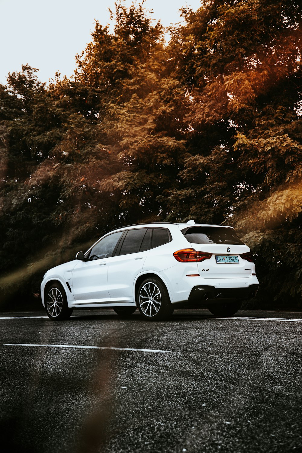 white bmw x series on road