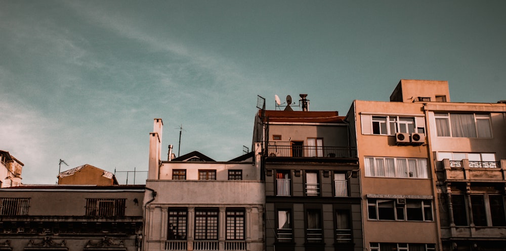 brown concrete building under blue sky during daytime