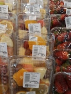 Fresh tropical fruits being carefully packed in a modern facility