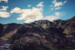 A picturesque landscape showcasing lush greenery and mountains.