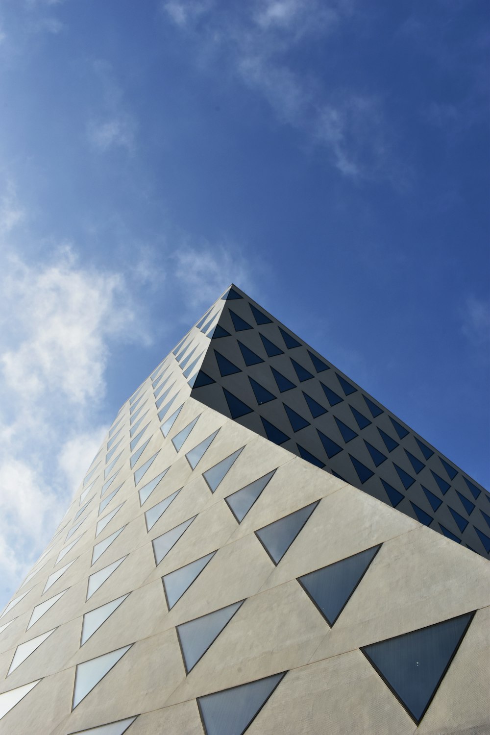 white concrete building under blue sky during daytime