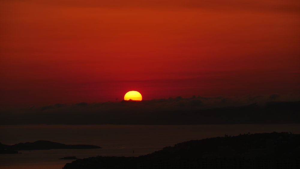 silhouette of mountain during sunset