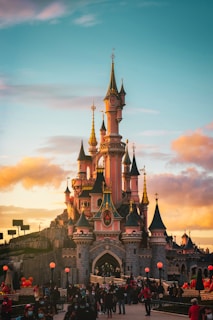 brown and blue castle under cloudy sky during daytime