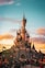 brown and blue castle under cloudy sky during daytime