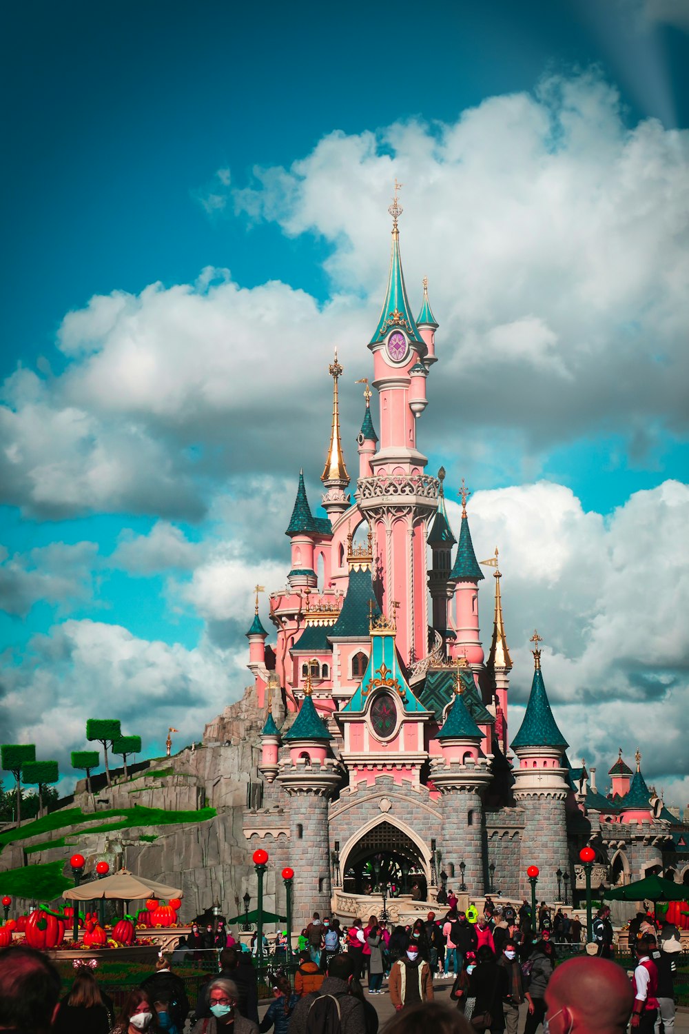 white and blue concrete castle under cloudy sky