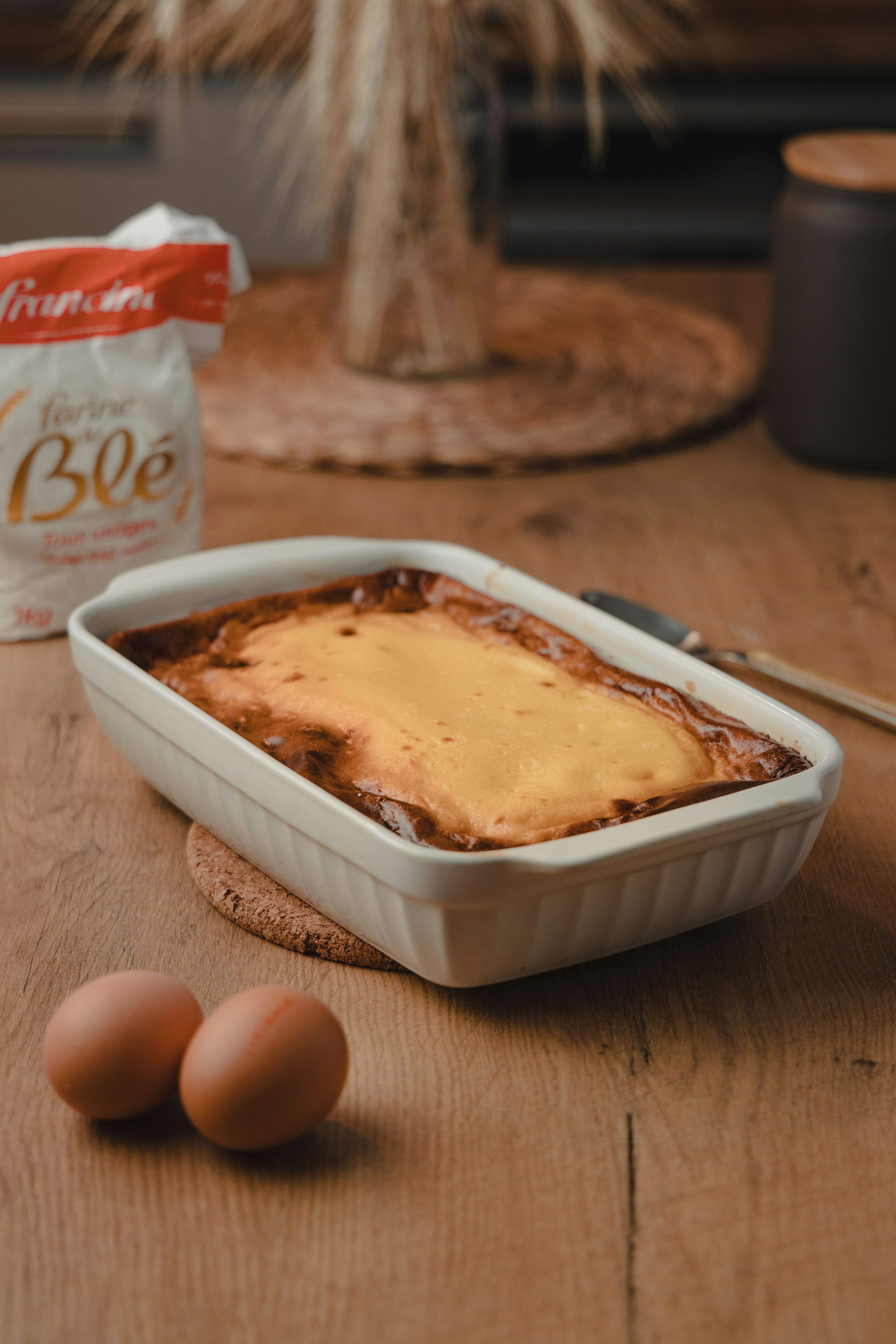 white plastic container with brown food