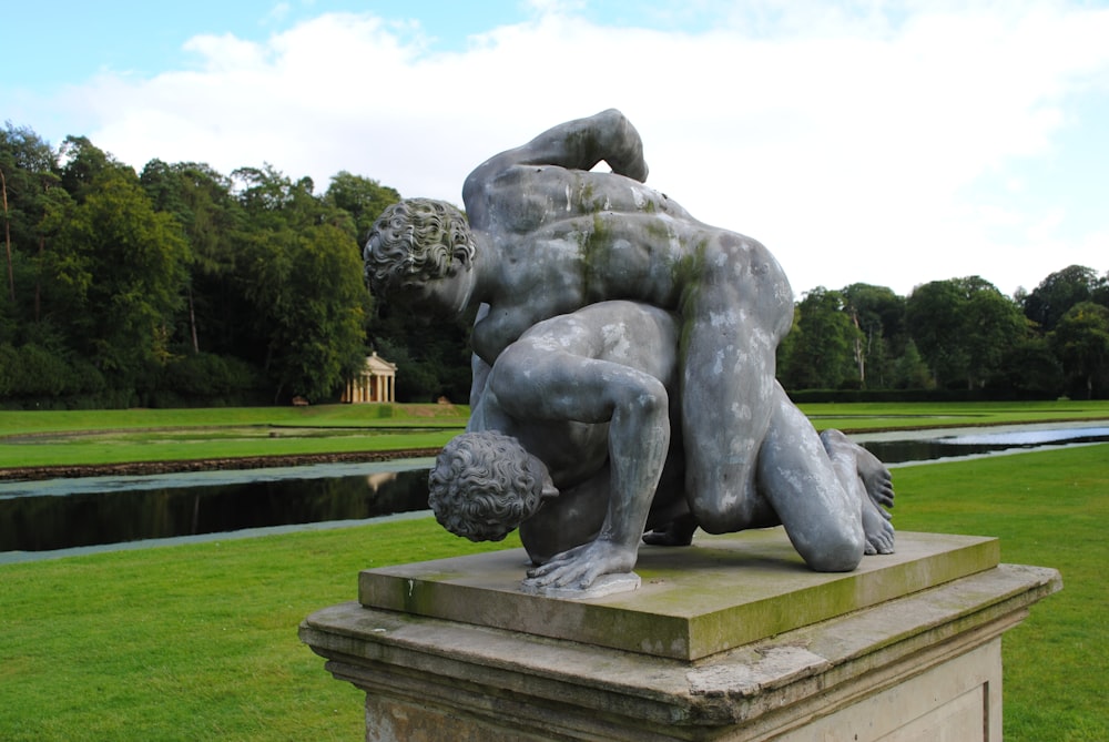 gray concrete statue of man