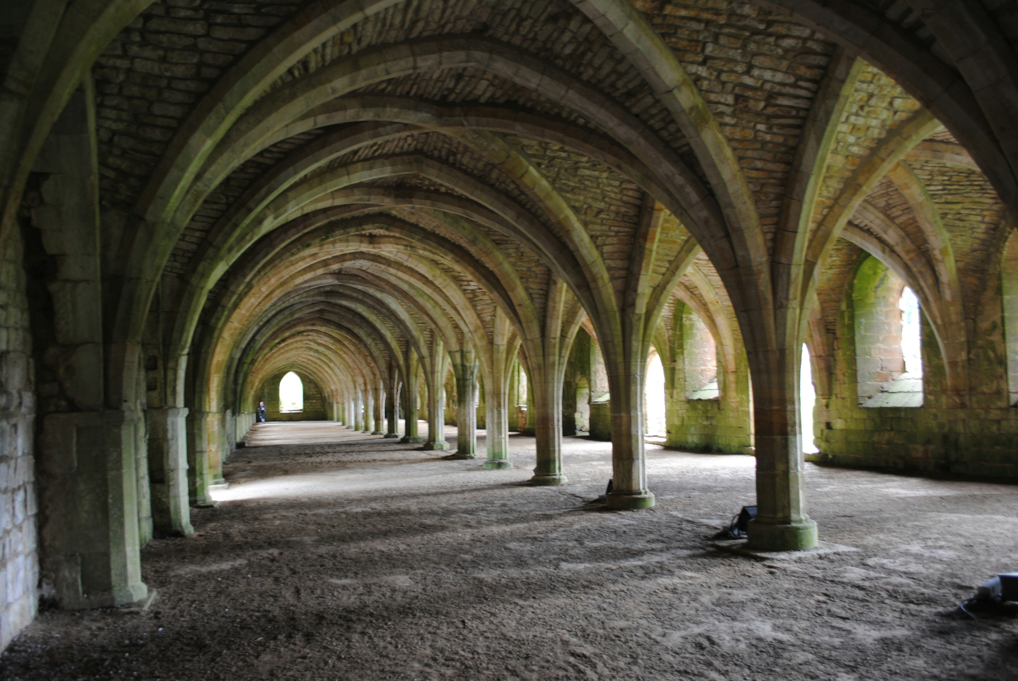 brown and beige concrete building, Arches at Fountains Abbey