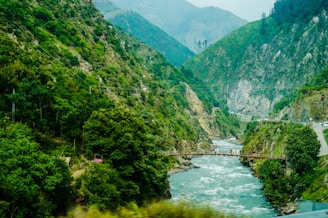 green mountains and river during daytime