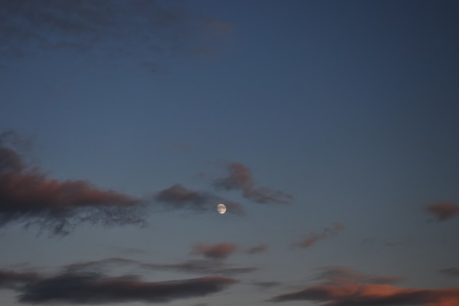 A peaceful night sky showing the moon phases, reflecting the calm mood of the platform.