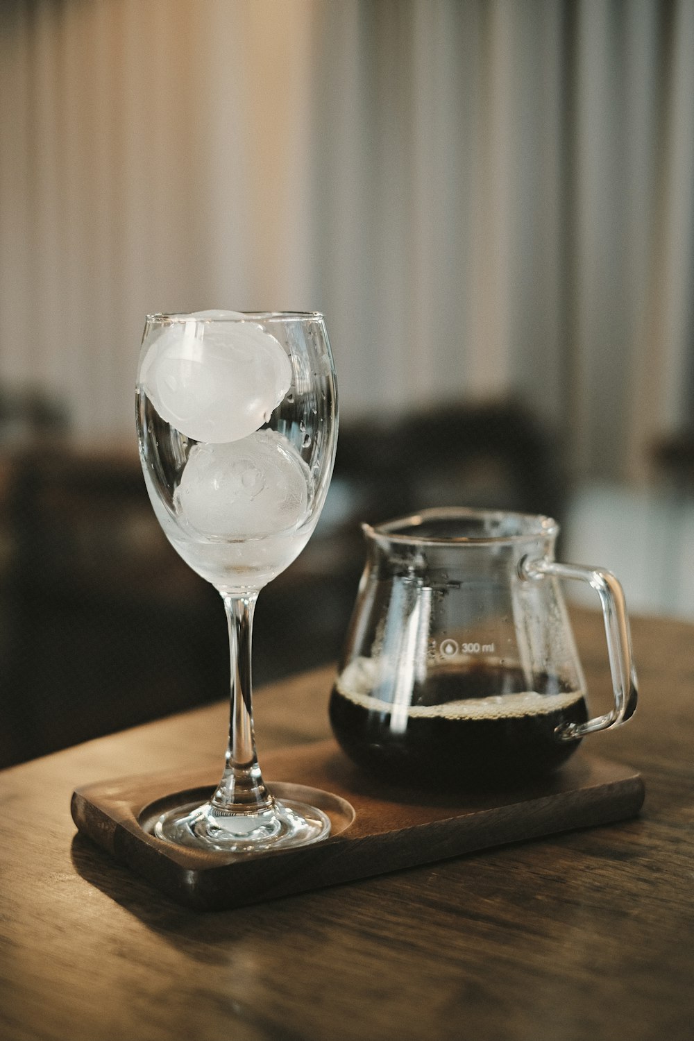 clear wine glass on brown wooden table