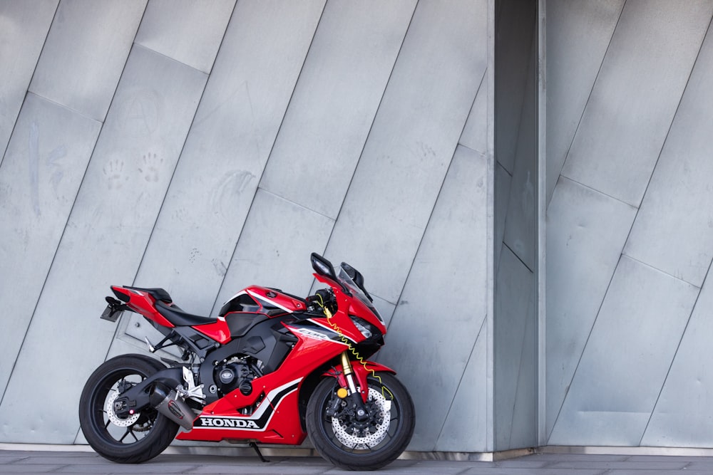 red and black sports bike