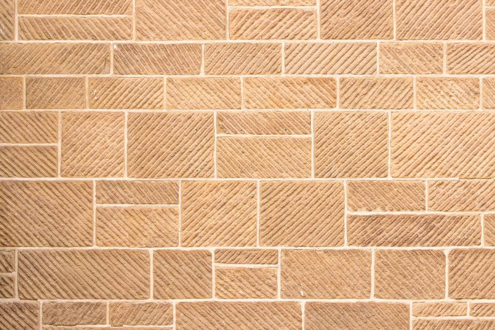 brown brick wall during daytime