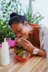 woman in white lace shirt holding brown woven basket