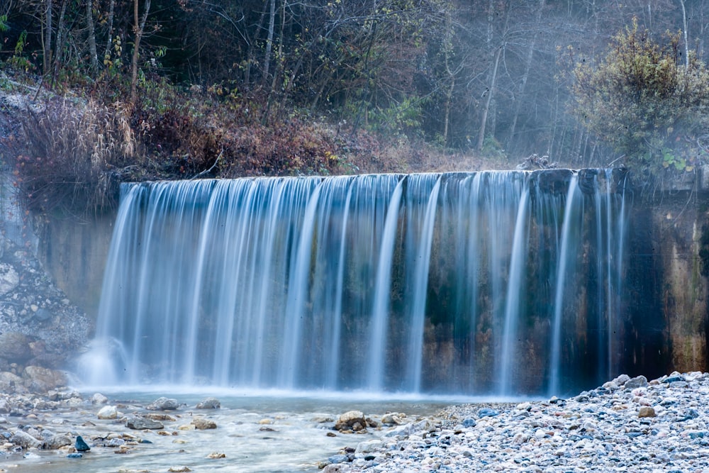 water falls on brown soil