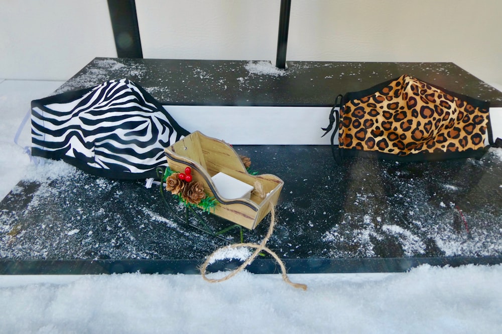 black and white zebra print handbag on black and white zebra print textile