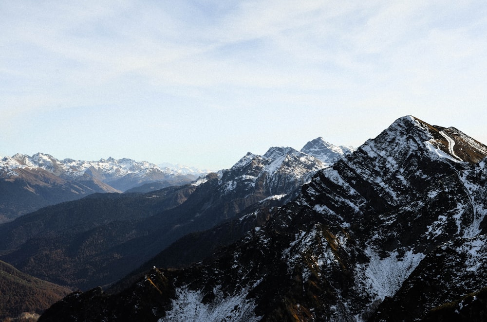 snow covered mountains during daytime