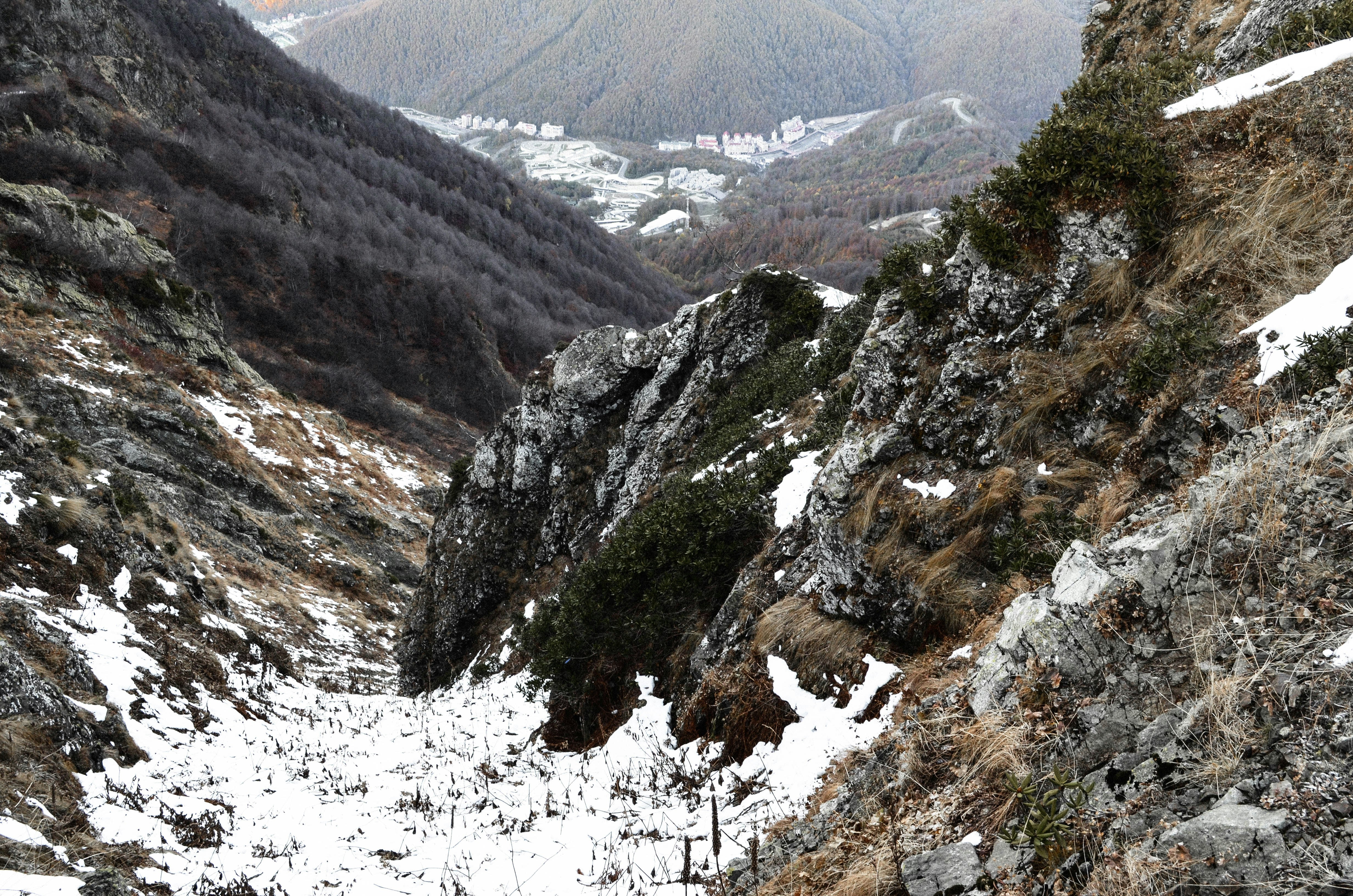 brown and white mountains covered with snow