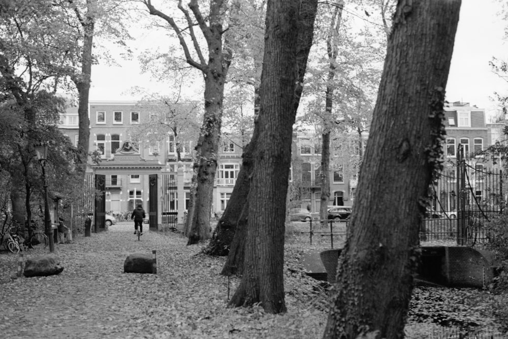 grayscale photo of people walking on street