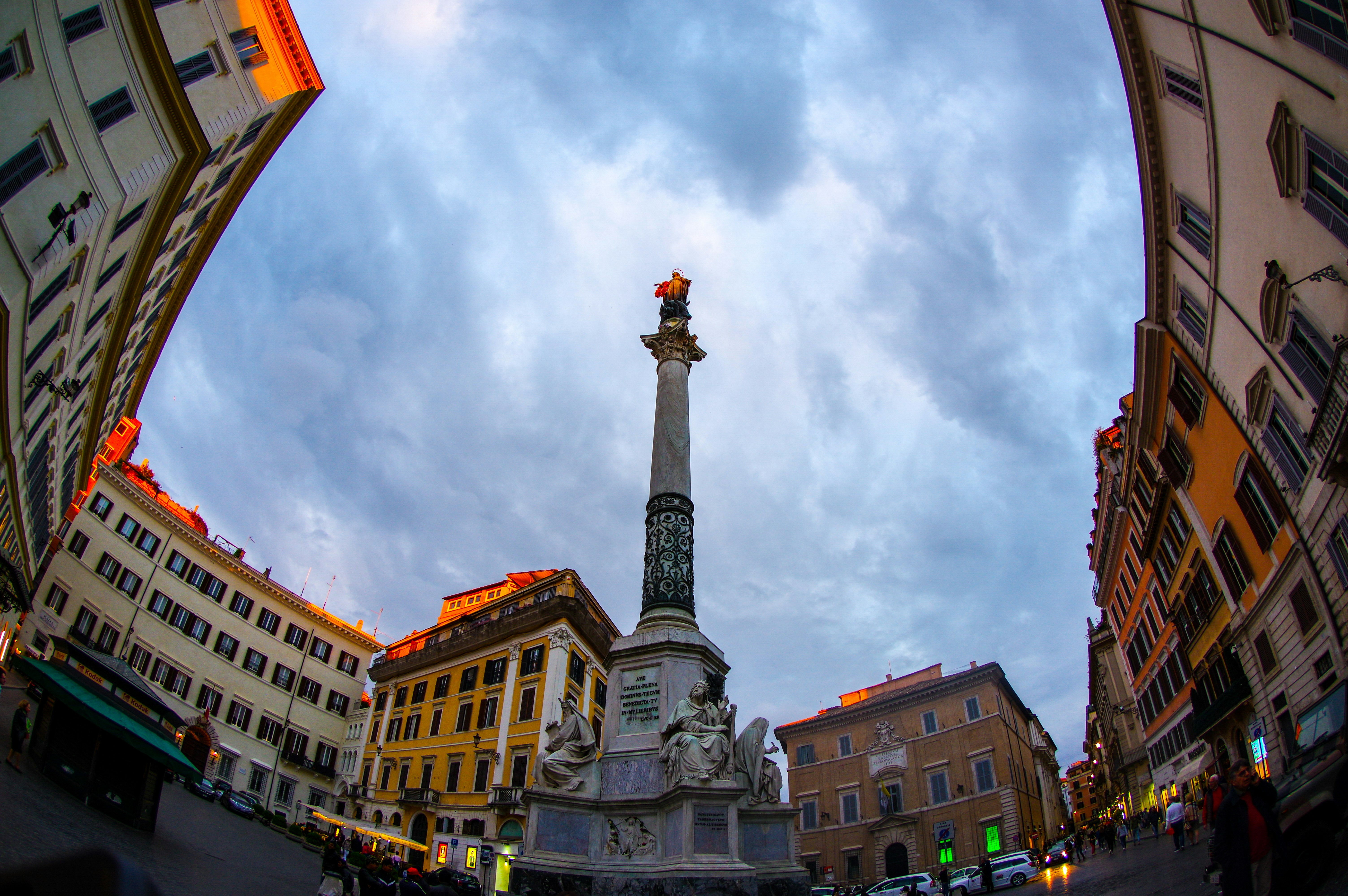 gray concrete tower under cloudy sky during daytime
