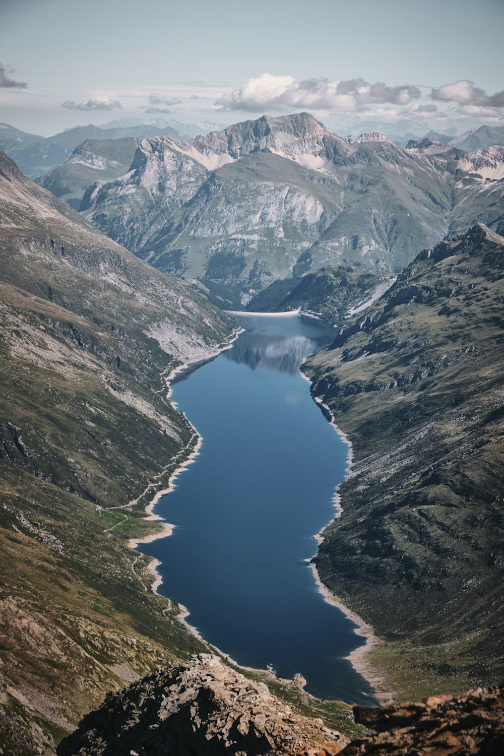 lake in the middle of mountains