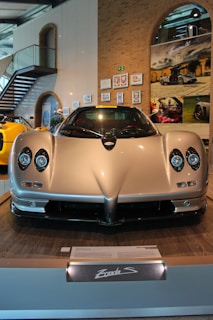 A stunning car displayed in a showroom.