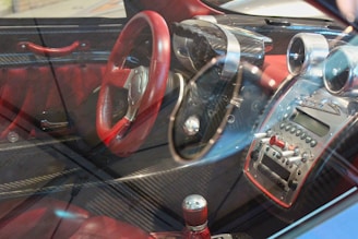 Sporty steering wheel with carbon fiber details and red accents