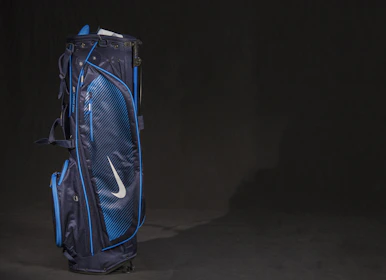 A sleek, modern sports bag featuring custom embroidery and vibrant accents.