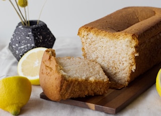 sliced bread on brown wooden chopping board