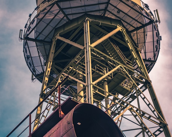 gray and red metal tower