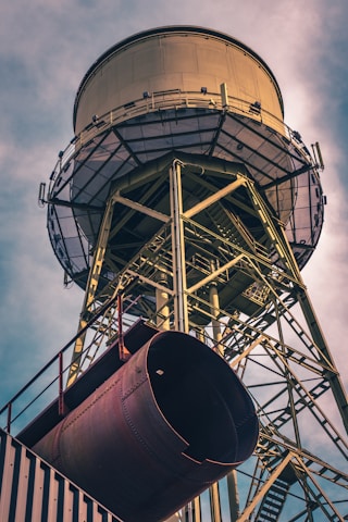 gray and red metal tower